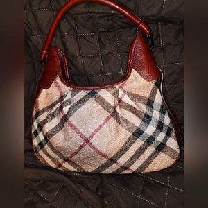 Authentic Burberry shoulder bag measuring 14 inches in length and 10 inches high
